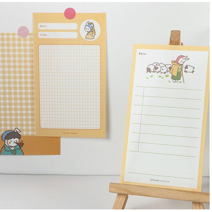 Memopad warna pastel motif kucing dan anjing