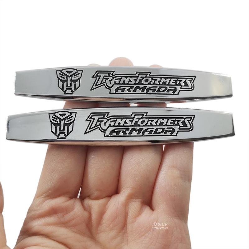 2pcs Stiker Emblem Logo Transformer Bahan Metal Untuk Dekorasi Mobil / Motor / Sepeda
