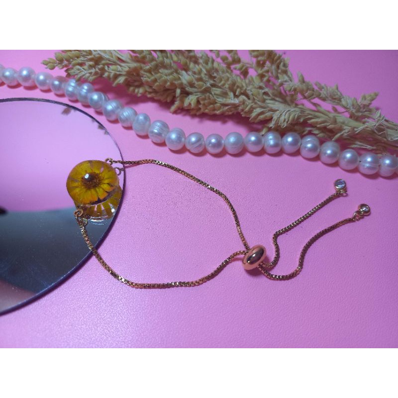 Gelang resin dengan bunga kering asliGelang Rantai Bahan Kuningan Dengan Cubic Zirconia Ukuran 1mm
P