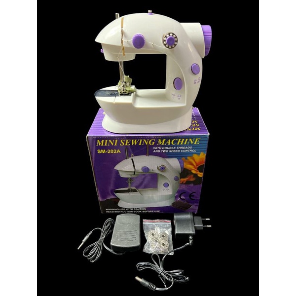 Mesin Jahit Portabel