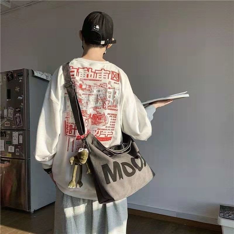 ✉﹉✎Sera bag wanita 2021 populer kapasitas besar tas kanvas siswa ransel utusan sederhana dan serbaguna tas pasangan gaya malas