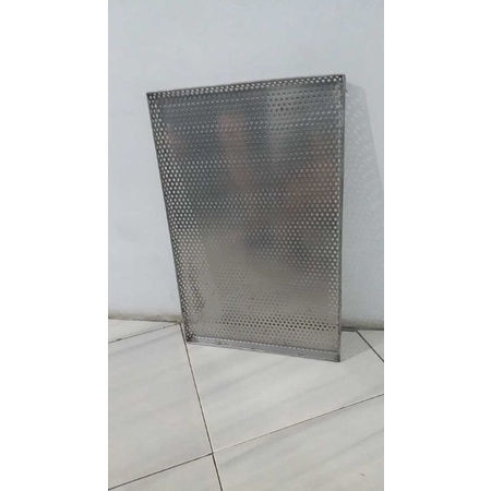 loyang plat lubang stainless steel 304 tebal 1mm