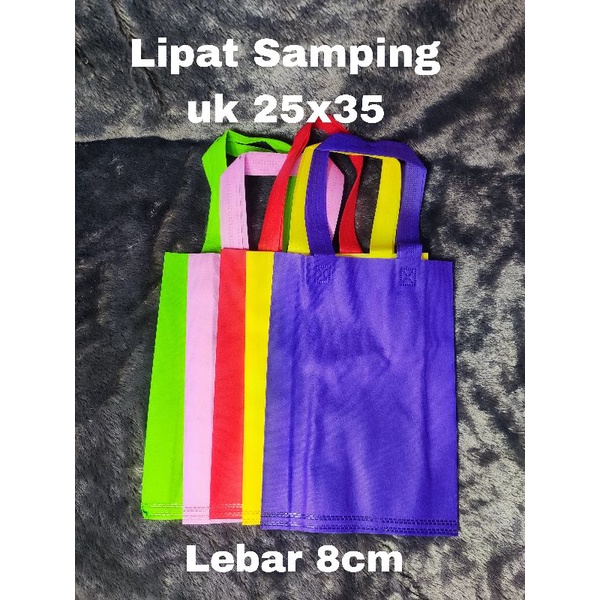 

Tas Handle 25x35 / Tas Spunbond Polos / Goodie Bag