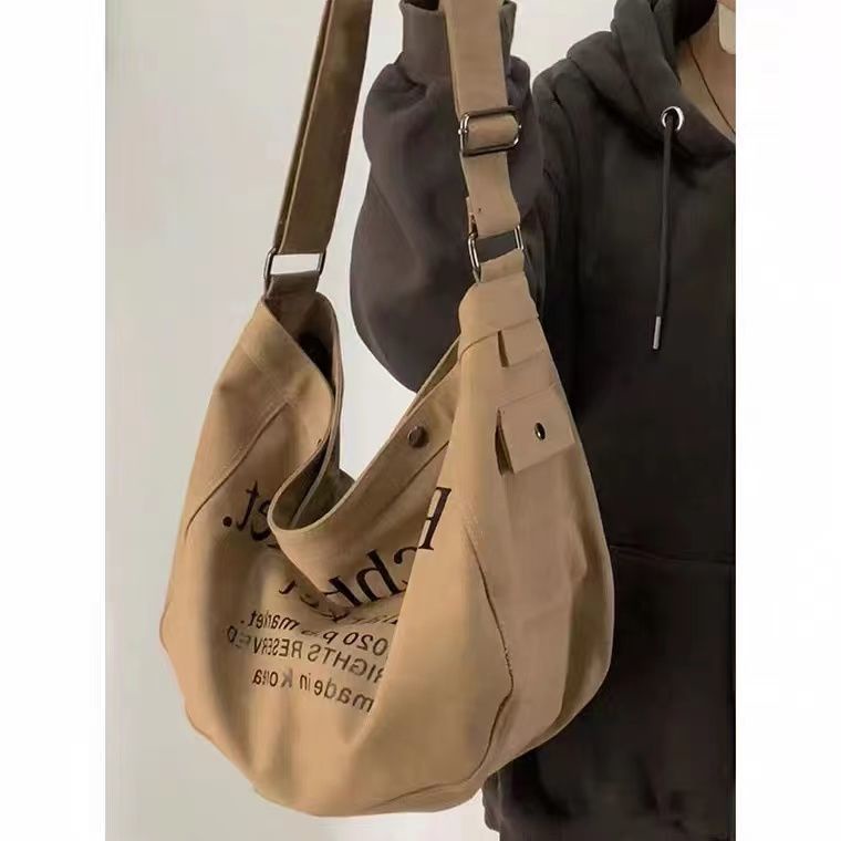 ❦☸Tas wanita kanvas tas besar high-end tote bag tas kelas niche messenger bag tas kanvas tas komuter bahu mahasiswa