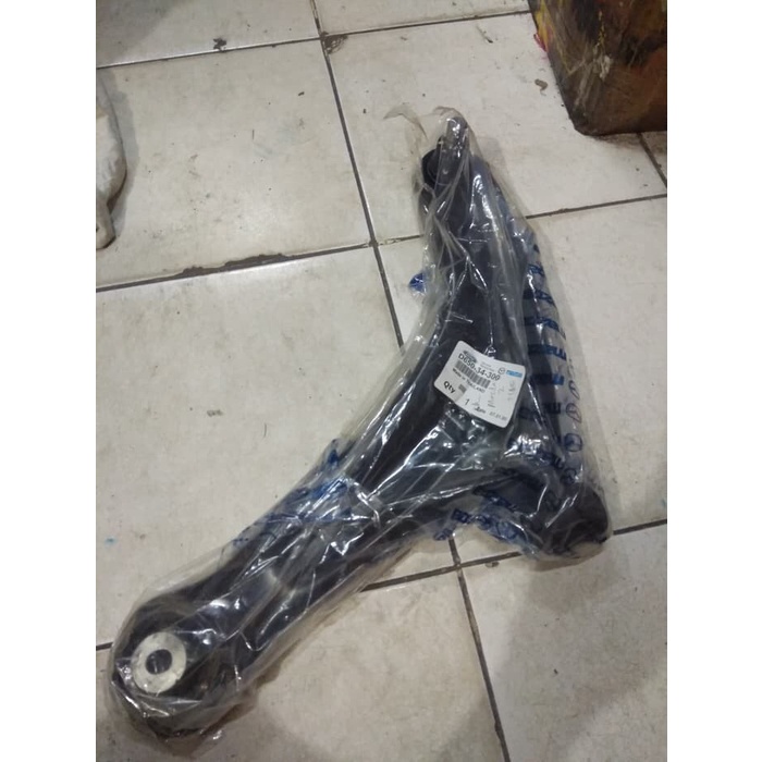 lower arm sayap mazda 2 original .
