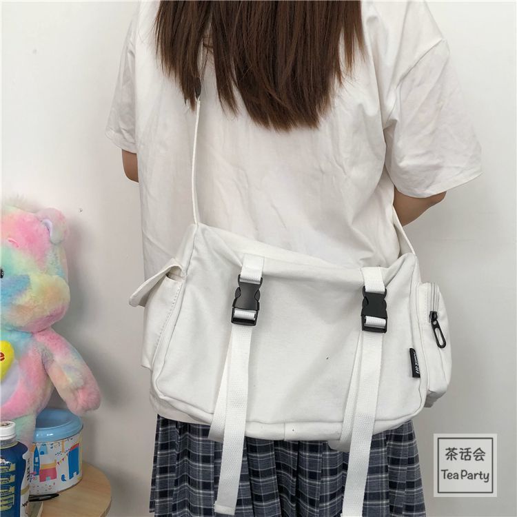 ▩❁Harajuku Jepang Dark Fan Energi Perkakas Tas Kanvas Wanita Korea All-Match Warna Solid Siswa Tas Messenger Satu Bahu