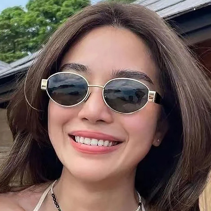 Kacamata Hitam Pelindung UV Bentuk Oval Gaya Vintage Untuk Wanita