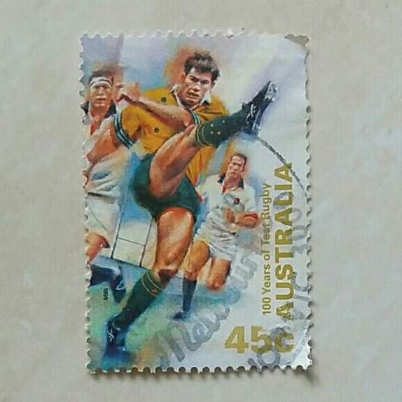 

(AD) Perangko Australia 1999 Centenary of Australian Test Rugby - Kicking the ball against England 45c Used