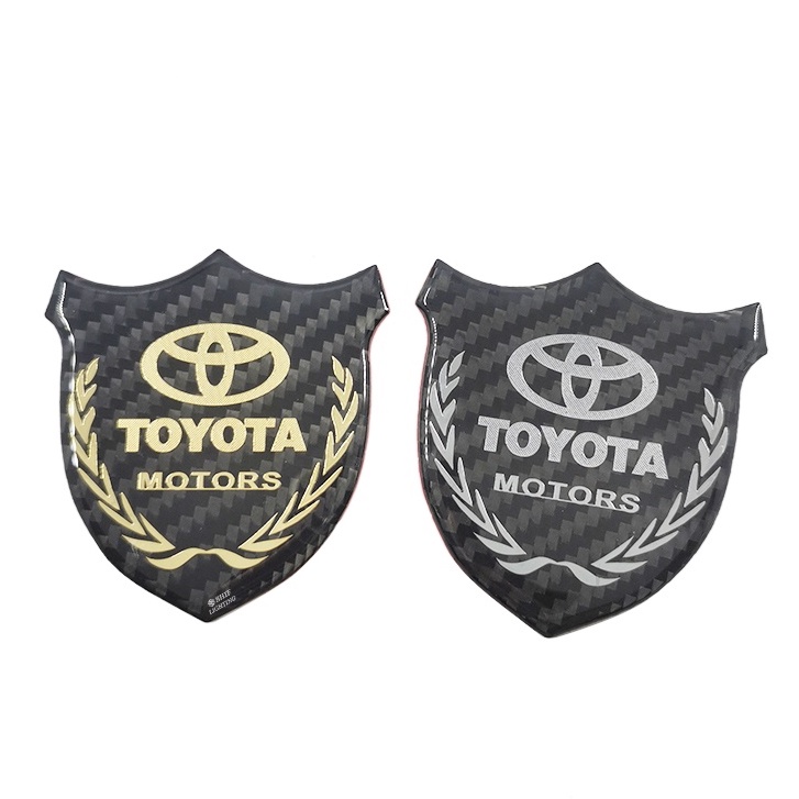 1pc Stiker Emblem Logo TOYOTA MOTORS Bahan Karbon Fiber Untuk Dekorasi Jendela Samping Mobil