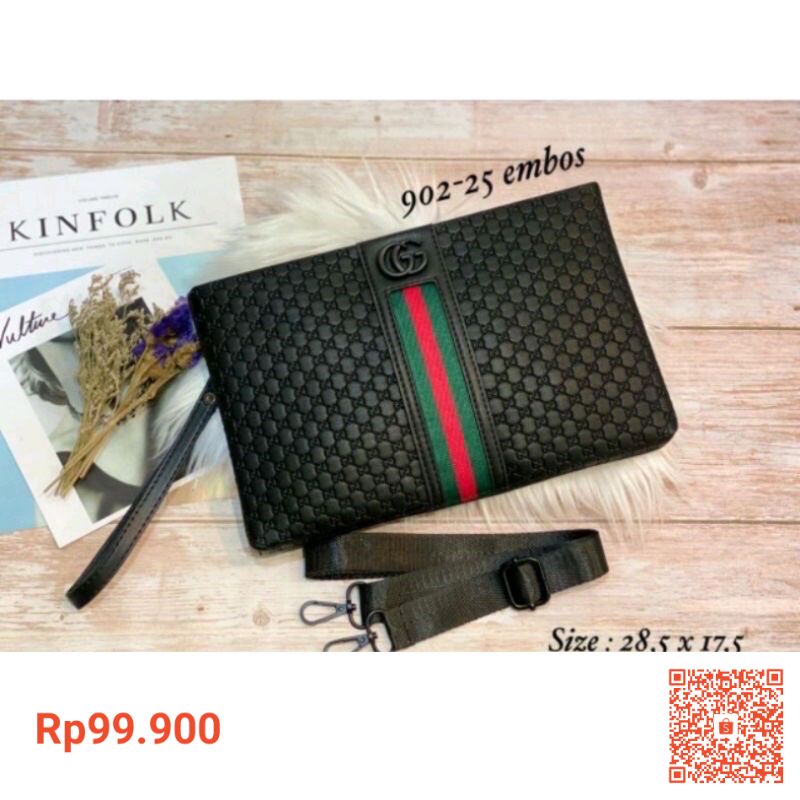 clutch cewek cowok import