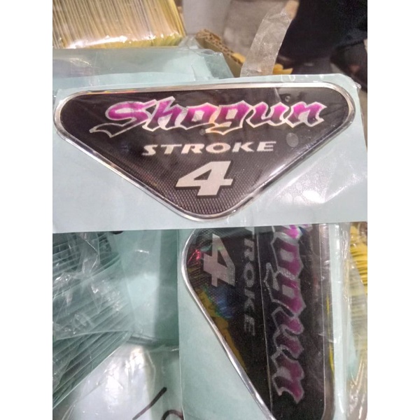 Emblem logo stiker timbul Panel Tameng dada depan Suzuki shogun 110