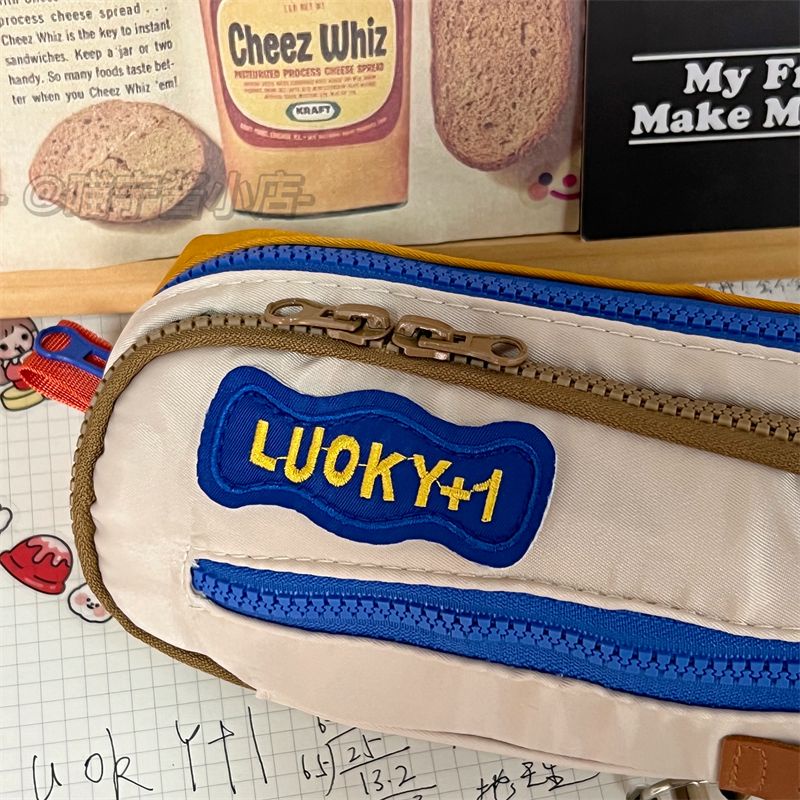 ✹▪♣Sera warna kontras mahasiswa perempuan multi-fungsional niche kapasitas besar tiga lapis tas penyimpanan alat tulis retro bernilai tinggi tas pensil