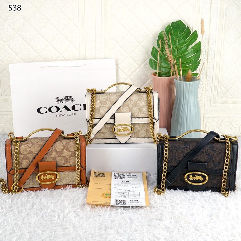 Coa Riley Top Handle Mini Bag 538