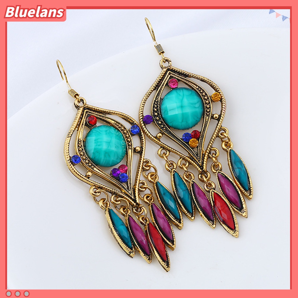 Anting Kait Gantung Panjang Desain Ukiran Hollow Bahan Resin Gaya Bohemian Untuk Wanita