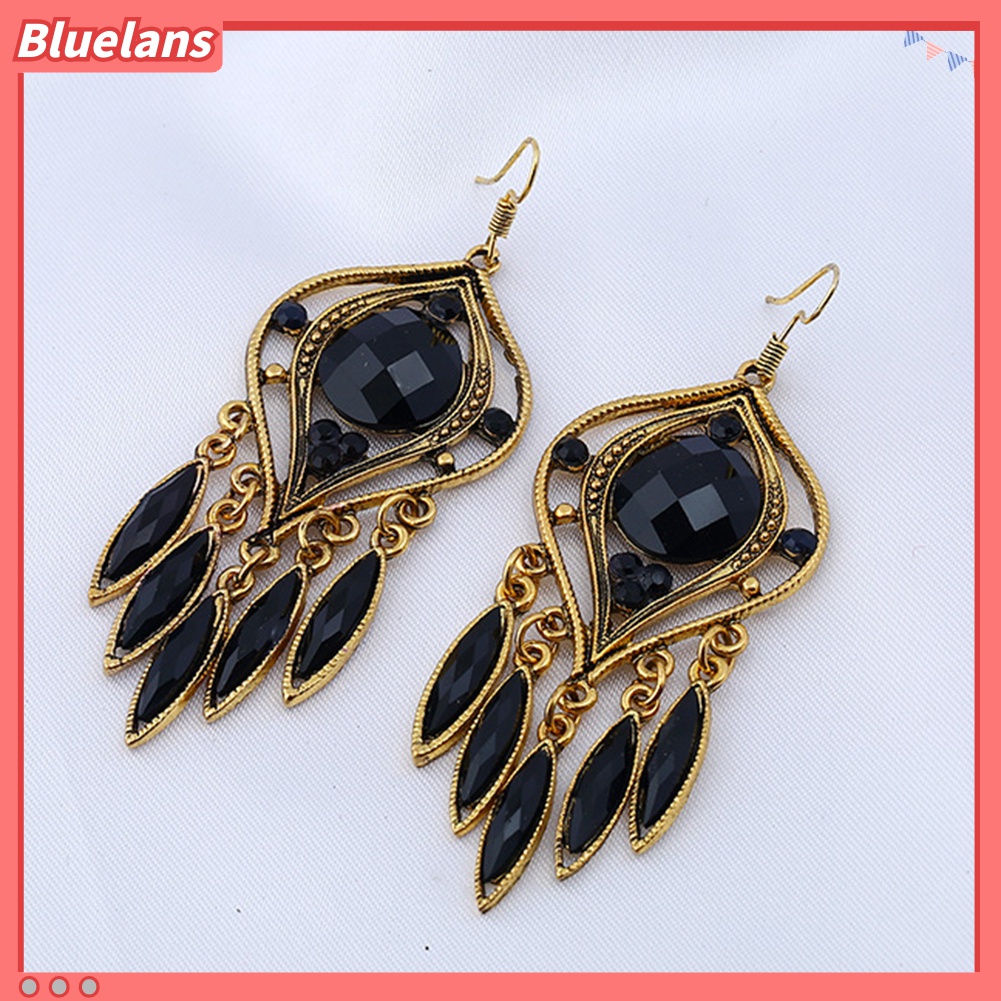 Anting Kait Gantung Panjang Desain Ukiran Hollow Bahan Resin Gaya Bohemian Untuk Wanita