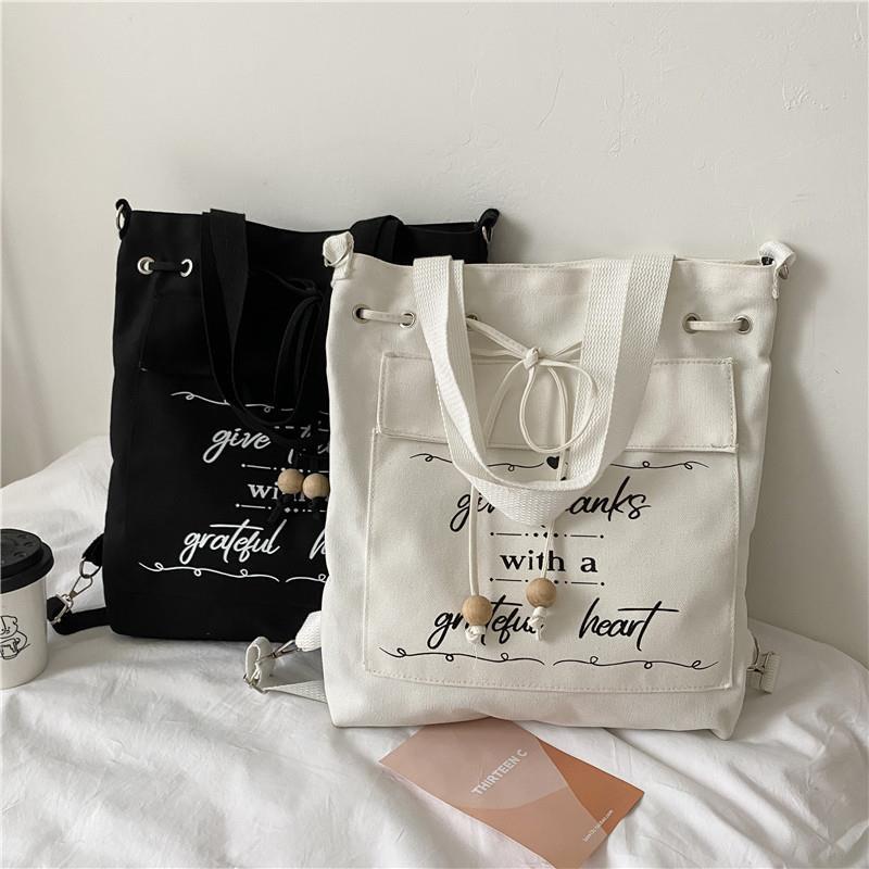 ✌✳Sera 2022 baru tas kanvas siswa perempuan tas bahu satu bahu versi Korea sastra tas messenger sederhana dan serbaguna