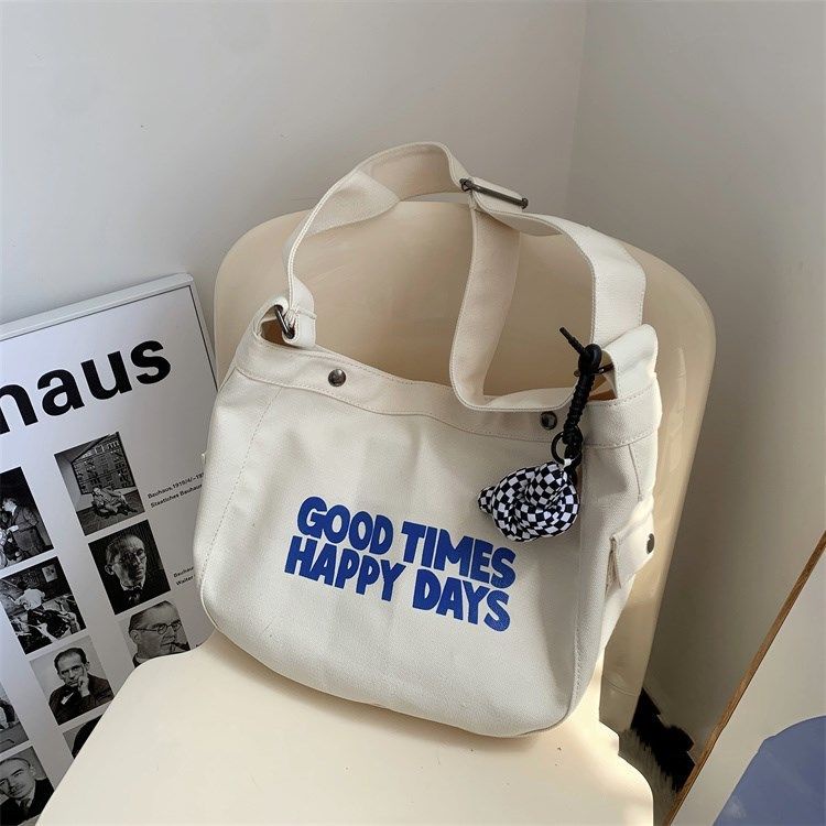 ✢✺✸Tas komuter Jepang in letter printing niche girl all-match canvas bag student class tas messenger berkapasitas besar