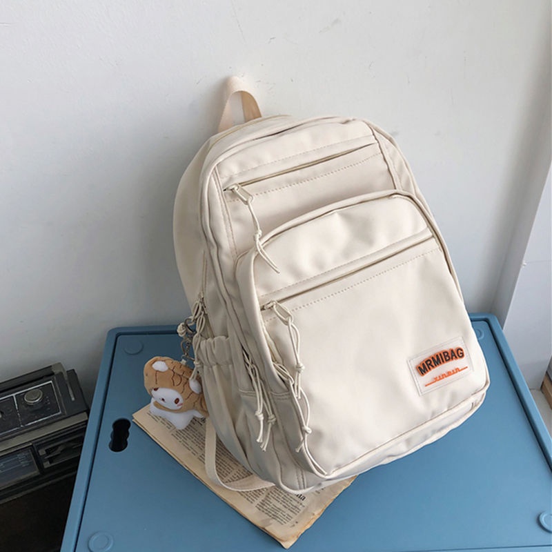 Sera tas sekolah wanita ransel musim panas siswa sekolah menengah dapat memegang tas komputer 14-inci rasa sederhana ransel perjalanan niche asli