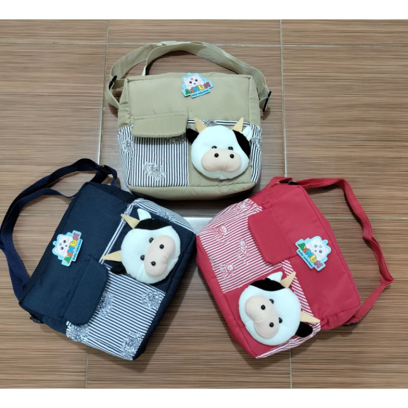 PROMO !!! Tas bayi dengan  saku depan tutup dengan tambahan boneka sapi lucu