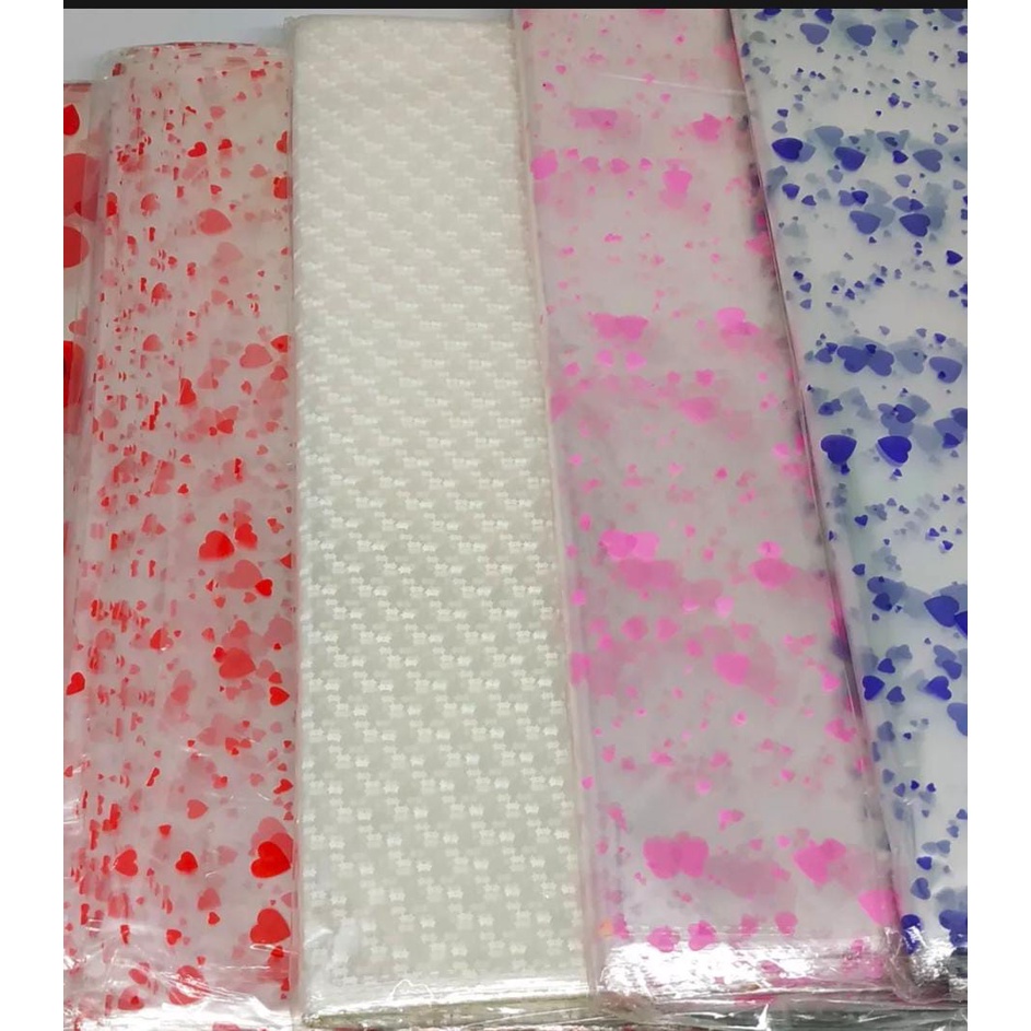 

PLASTIK PARSEL/PLASTIK HAMPERS TRANSPARAN MOTIF WARNA RANDOM (10 LEMBAR)