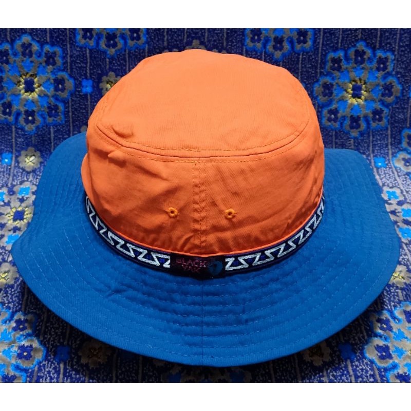 topi rimba black yak oren