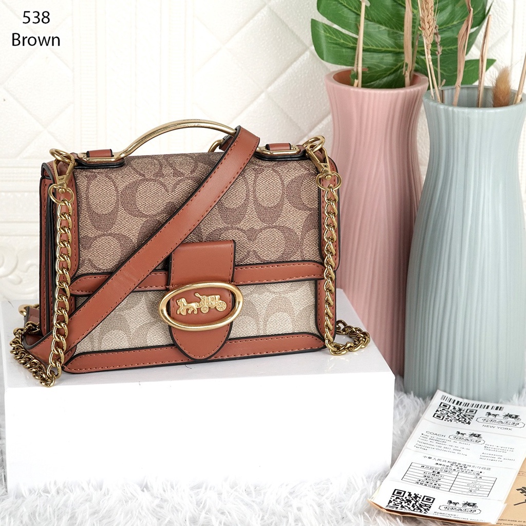 Coa Riley Top Handle Mini Bag 538