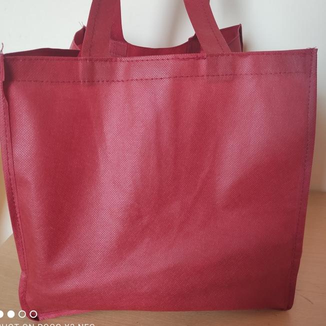 

tas besek spunbond 25x25 + harga perlusin