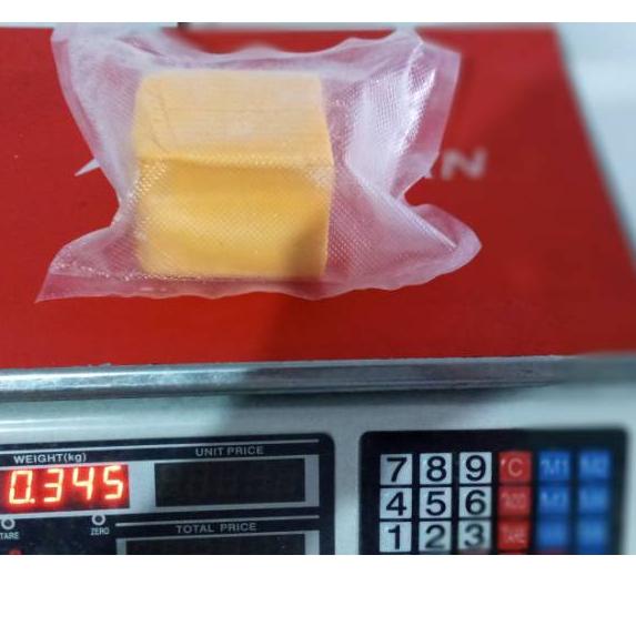 

Codeq7Q1c--Keju cheddar burger slice orange melted/Lumer meleleh