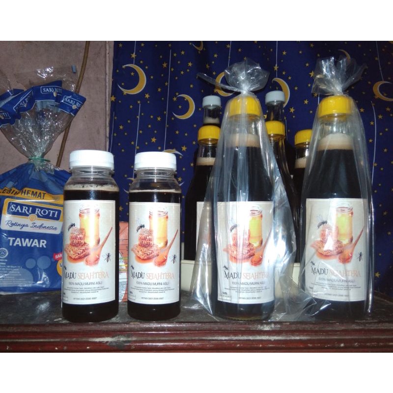 

madu akasia, madu hitam murni dari hutan Sumatra