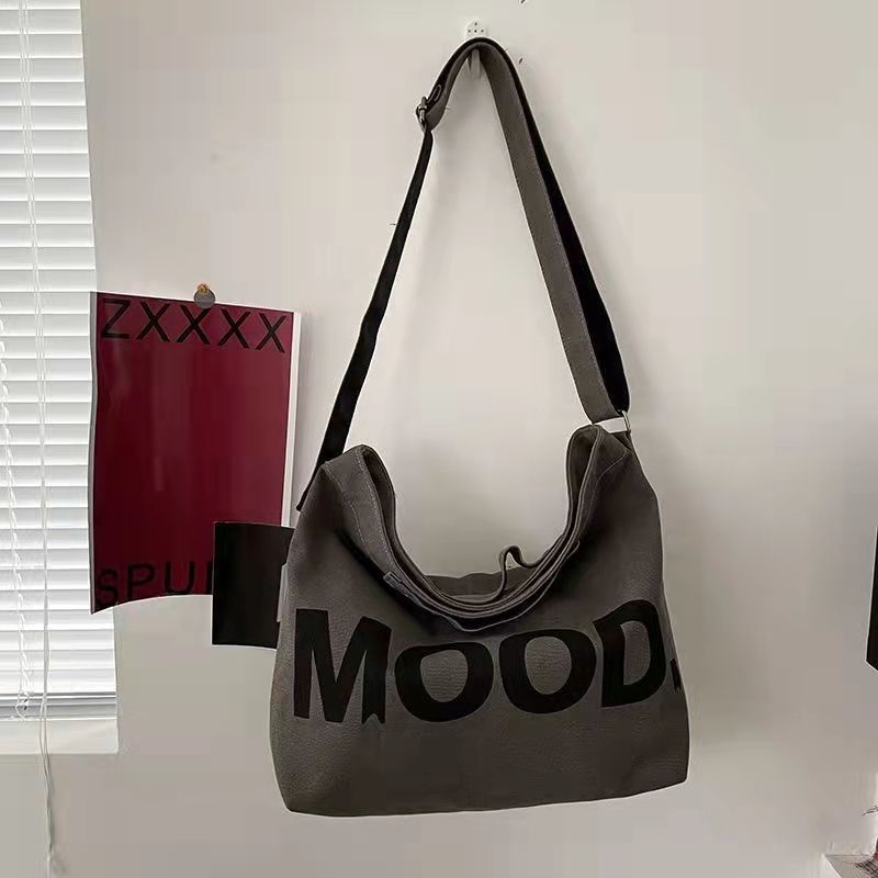 ✉﹉✎Sera bag wanita 2021 populer kapasitas besar tas kanvas siswa ransel utusan sederhana dan serbaguna tas pasangan gaya malas