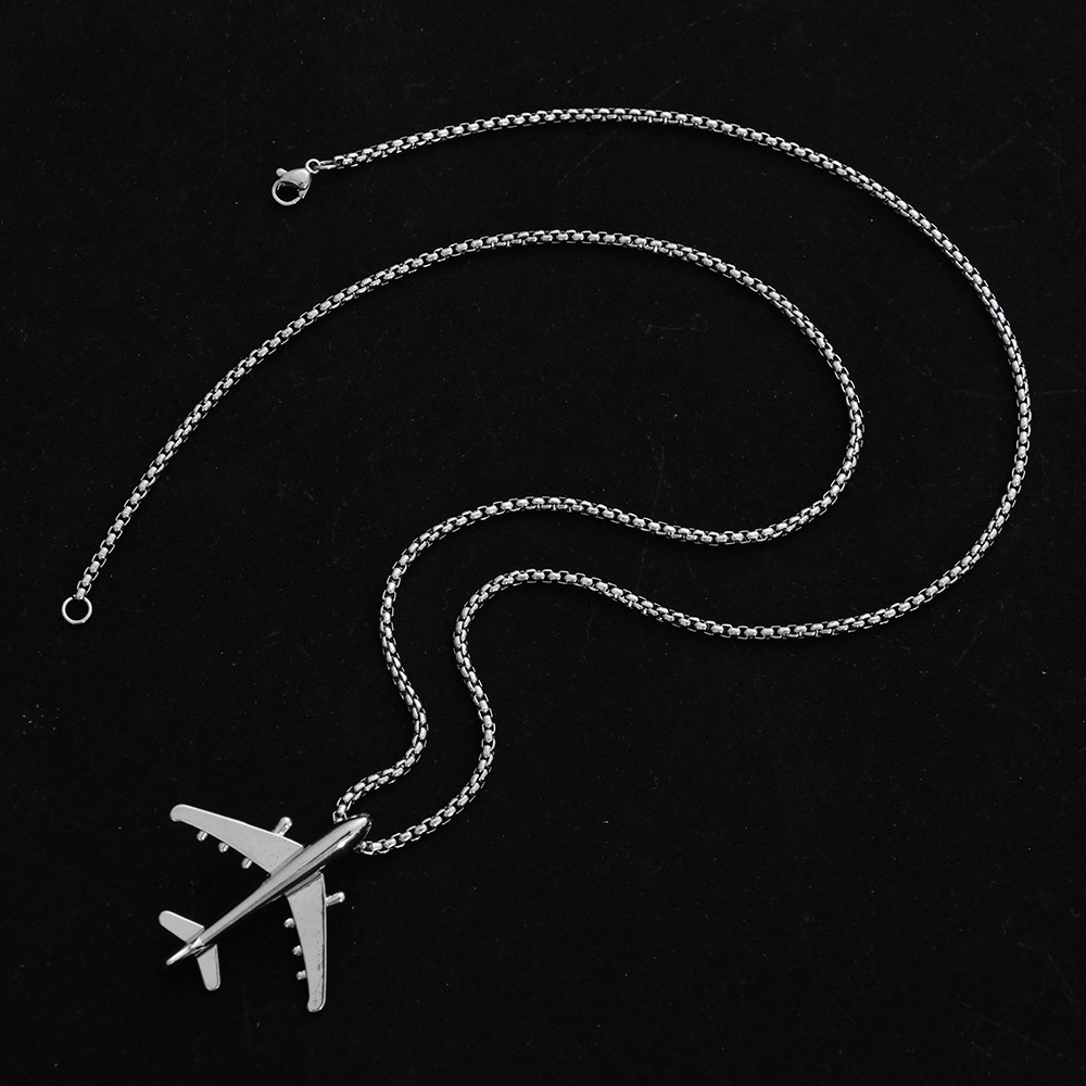Kalung Liontin Bentuk Pesawat Bahan Titanium Steel Gaya Hip Hop
