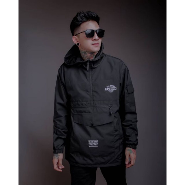 Bandung Storeid / Jaket Cagoule JNK / jaket bandung / jaket parasut / jaket heaking