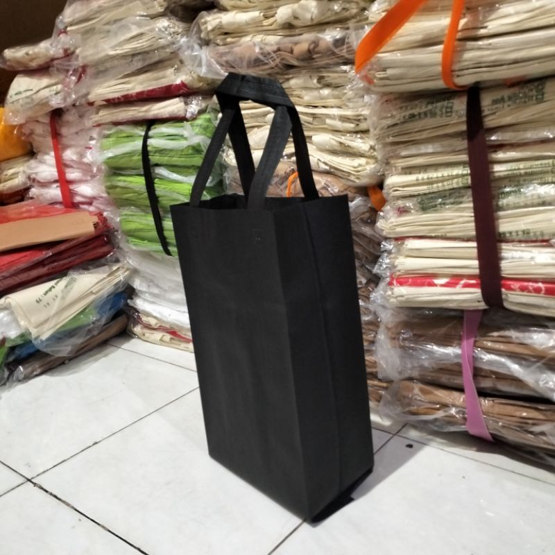 

tas spondbond/goodiebag lipat samping toples 23x40x10