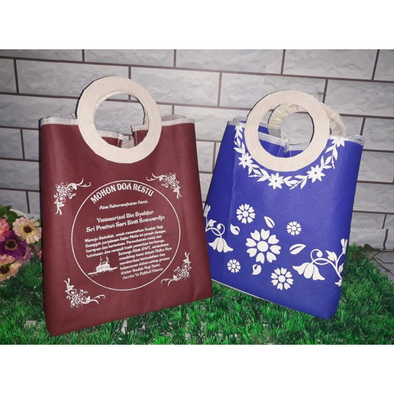 

TAS SOUVENIR HAJI/TAS OLEH-OLEH UMROH/TAS KHAJATAN GAGANG BULAT