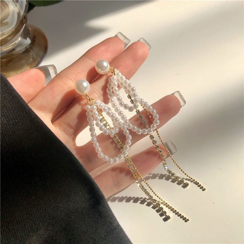 Anting Rumbai Panjang Aksen Mutiara Bahan S925 Silver Needle Gaya Korea Untuk Wanita