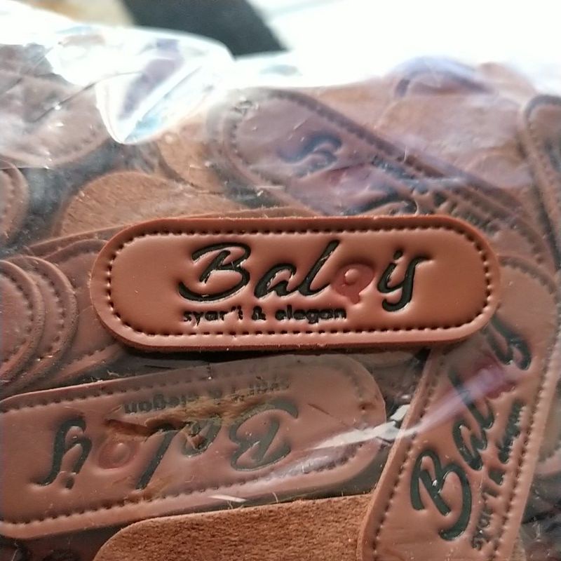 label kulit sintetis embos Balqis