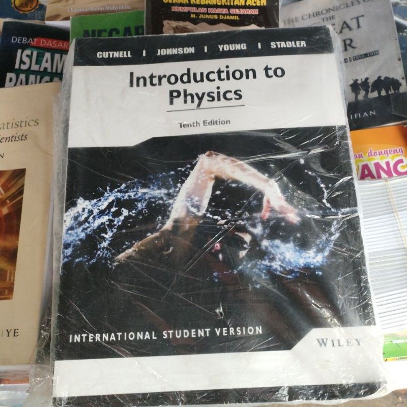 

introduction to physic Buku INTRODUCTION TO PHYSICS TENTH EDITION CUTNELL WILLEY