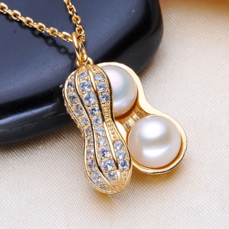 kalung titanium mutiara import