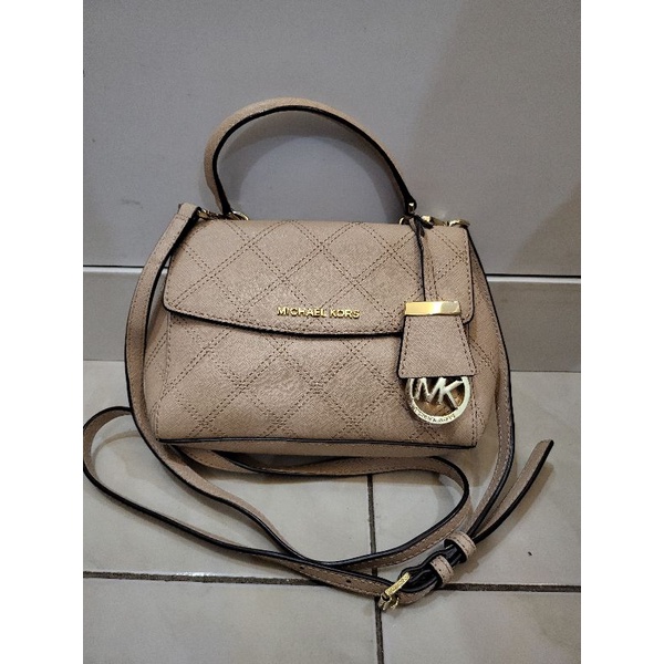 Mk mini ava sling bag preloved
