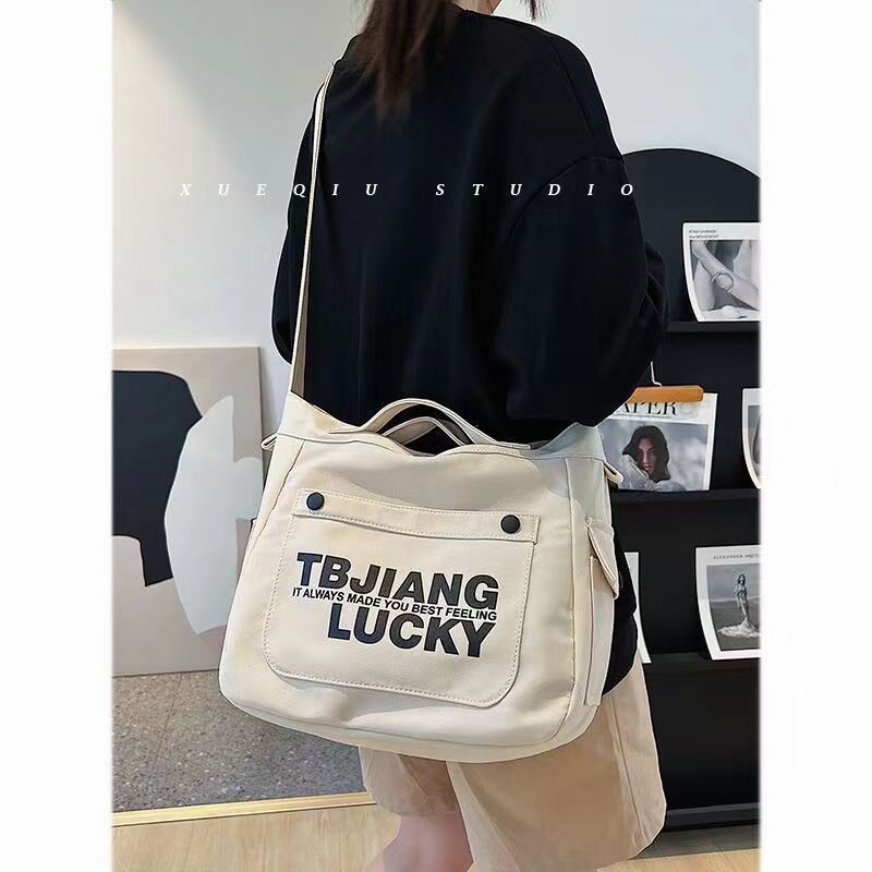 ✻Yang Xueqiu Tas Kanvas Jual Tas Wanita Musim Panas Kapasitas Besar Siswa Kelas Satu Bahu Messenger Tas Fashion Printing Tote Bag