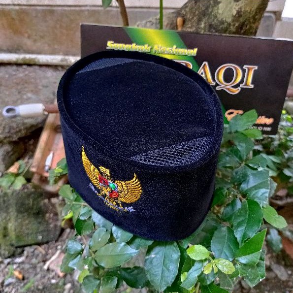 peci hitam AC logo garuda