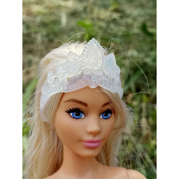 bando boneka varian putih