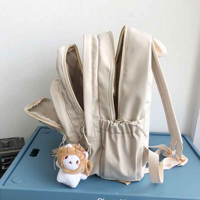 Sera tas sekolah wanita ransel musim panas siswa sekolah menengah dapat memegang tas komputer 14-inci rasa sederhana ransel perjalanan niche asli