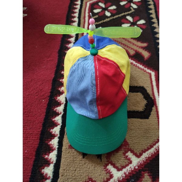 topi baling baling doraemon