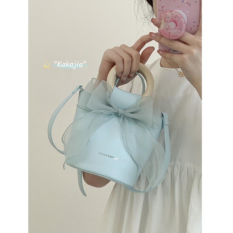 Suhao bow handbag wanita 2022 fashion trendi baru tas ember kecil segar cocok untuk semua tas messenger bahu tunggal