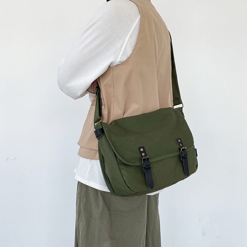 ﺴ✑Jepang In Wild Messenger Bag College Gaya Mahasiswa Tas Kanvas Tas Pria Messenger Tas Wanita Tas Bahu