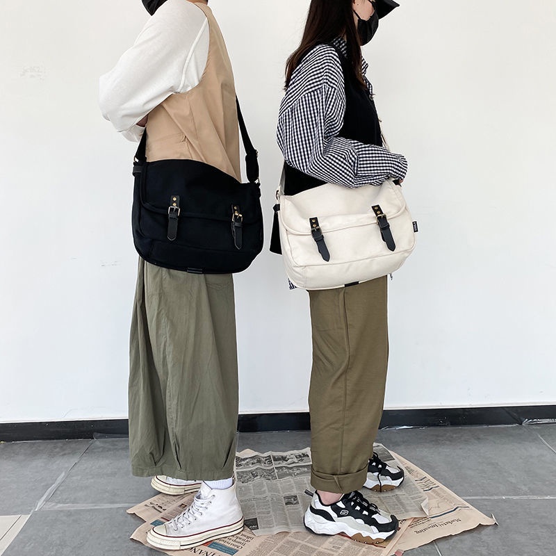 ﺴ✑Jepang In Wild Messenger Bag College Gaya Mahasiswa Tas Kanvas Tas Pria Messenger Tas Wanita Tas Bahu