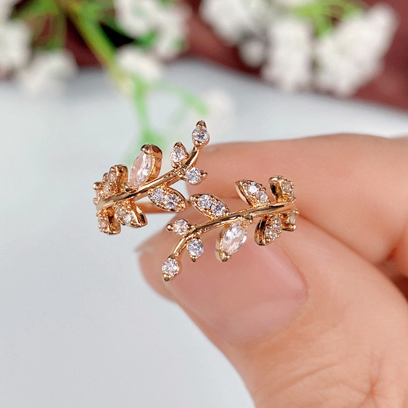 Fancyqube Cincin Model Terbuka Adjustable Bentuk Daun Zaitun Warna Silver / Gold Untuk Wanita