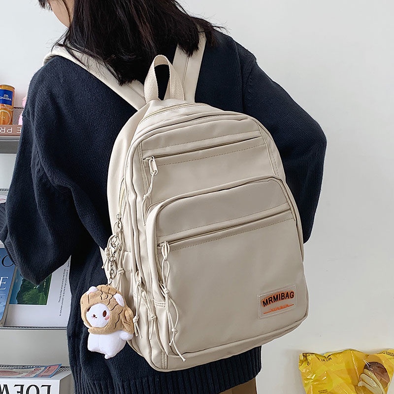 Sera tas sekolah wanita ransel musim panas siswa sekolah menengah dapat memegang tas komputer 14-inci rasa sederhana ransel perjalanan niche asli