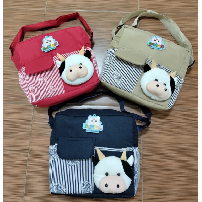 PROMO !!! Tas bayi dengan  saku depan tutup dengan tambahan boneka sapi lucu